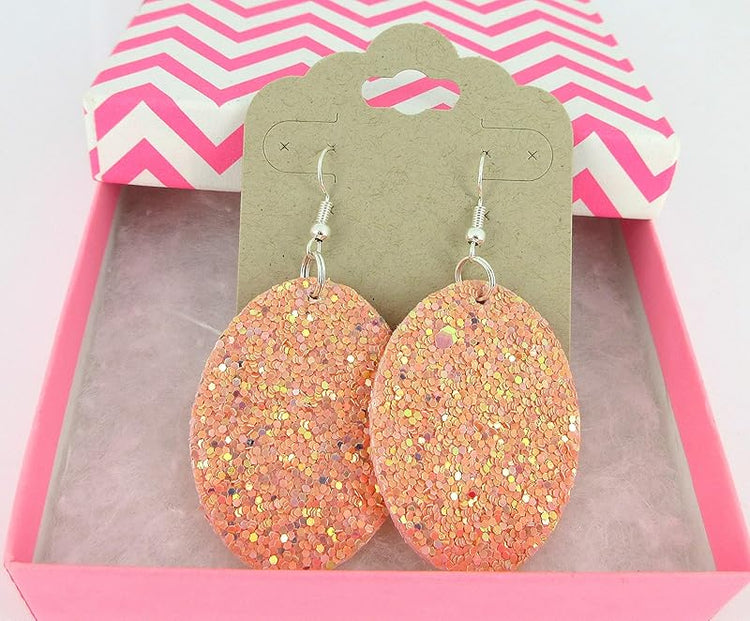 Summerfield Collection Silver-tone Glitter Faux Leather Oval Dangle Earrings (Peachy Pink)